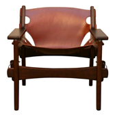 Lounge chairs with eucalyptus wood frame and cognac coloured leather.
